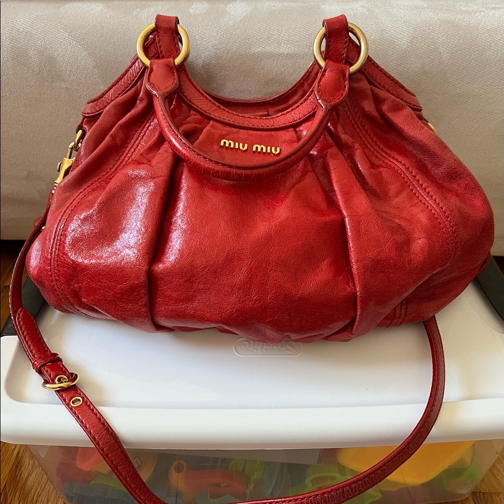 Miu Miu large hobo in red with long strap